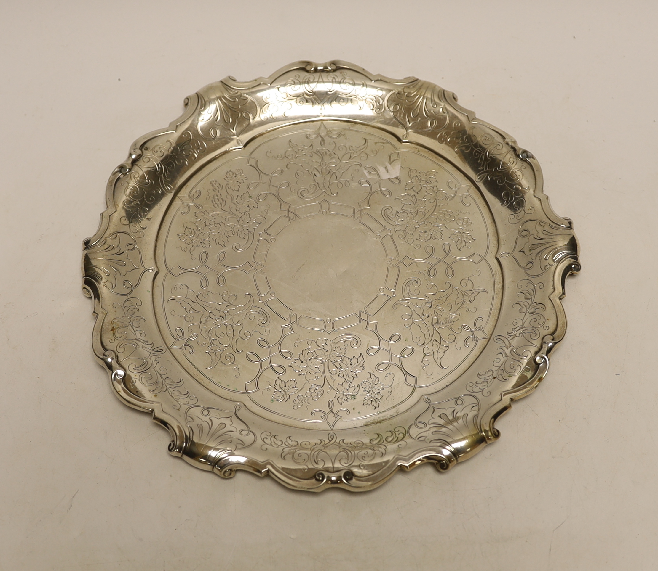 A late 19th/early 20th century Austro-Hungarian 800 standard white metal shaped circular dish, 27.5cm, 13.1oz.